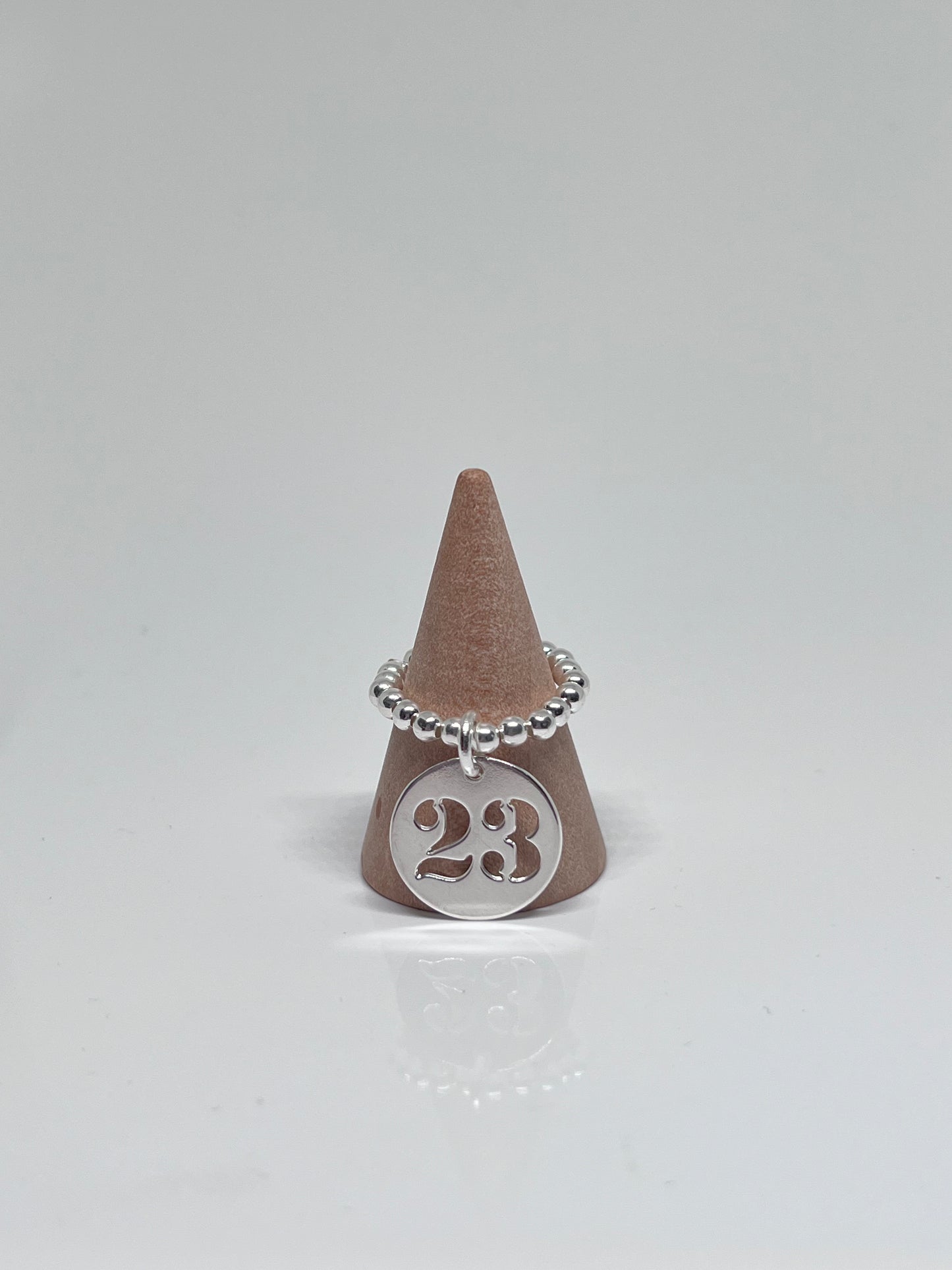 Bague perles médaille numéro