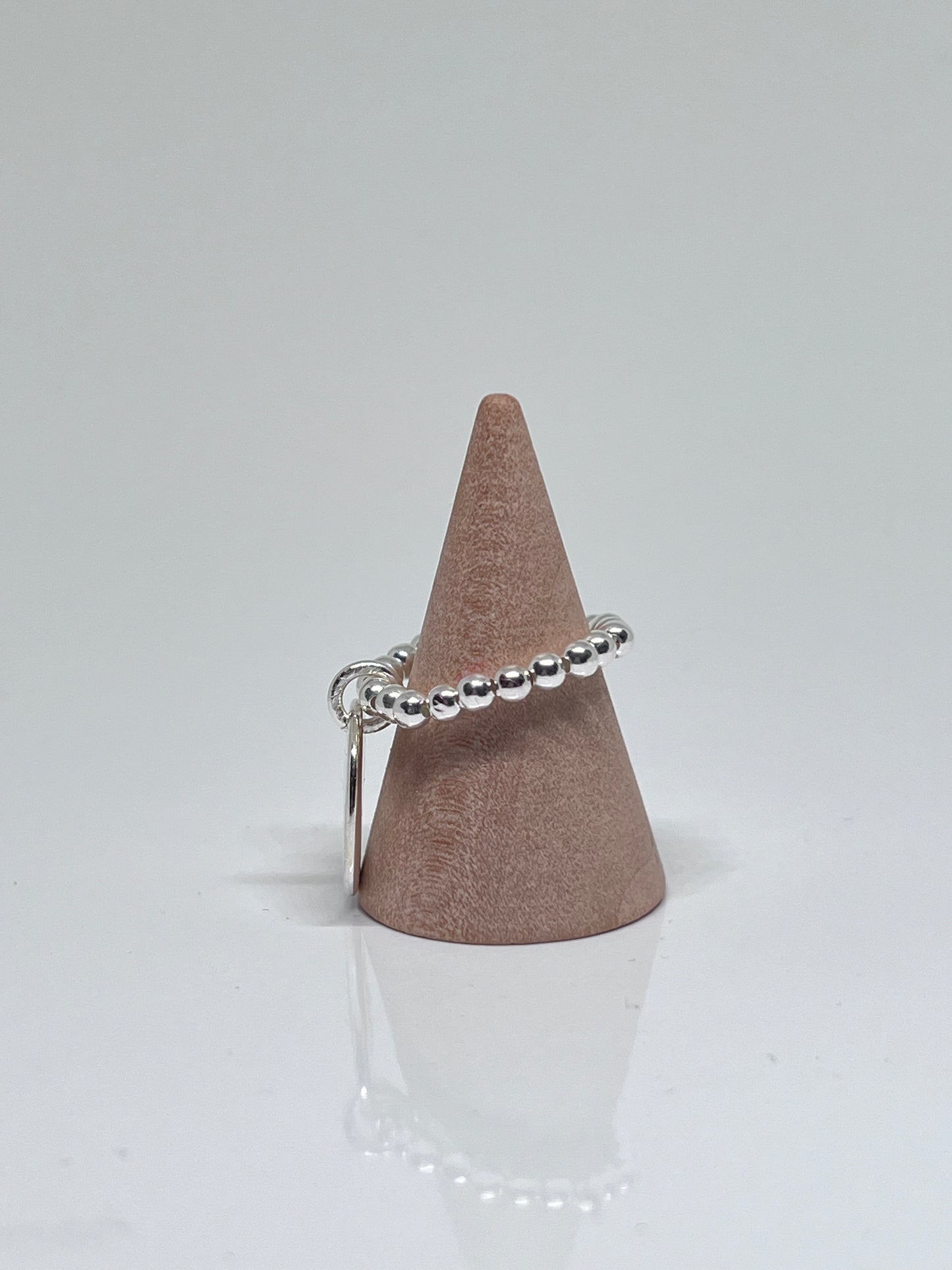 Bague perles médaille étoile creusée