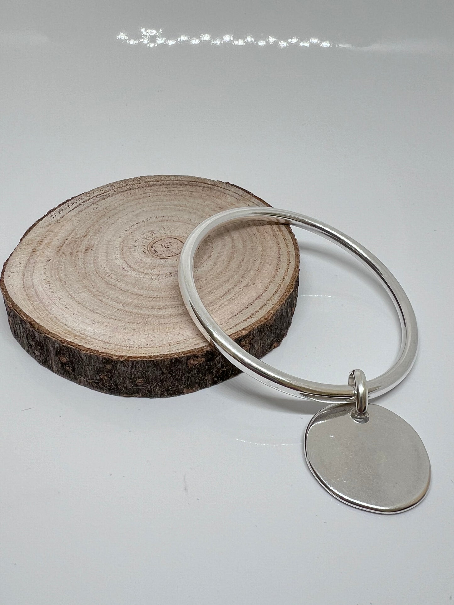 Jonc argent grosse mdaille