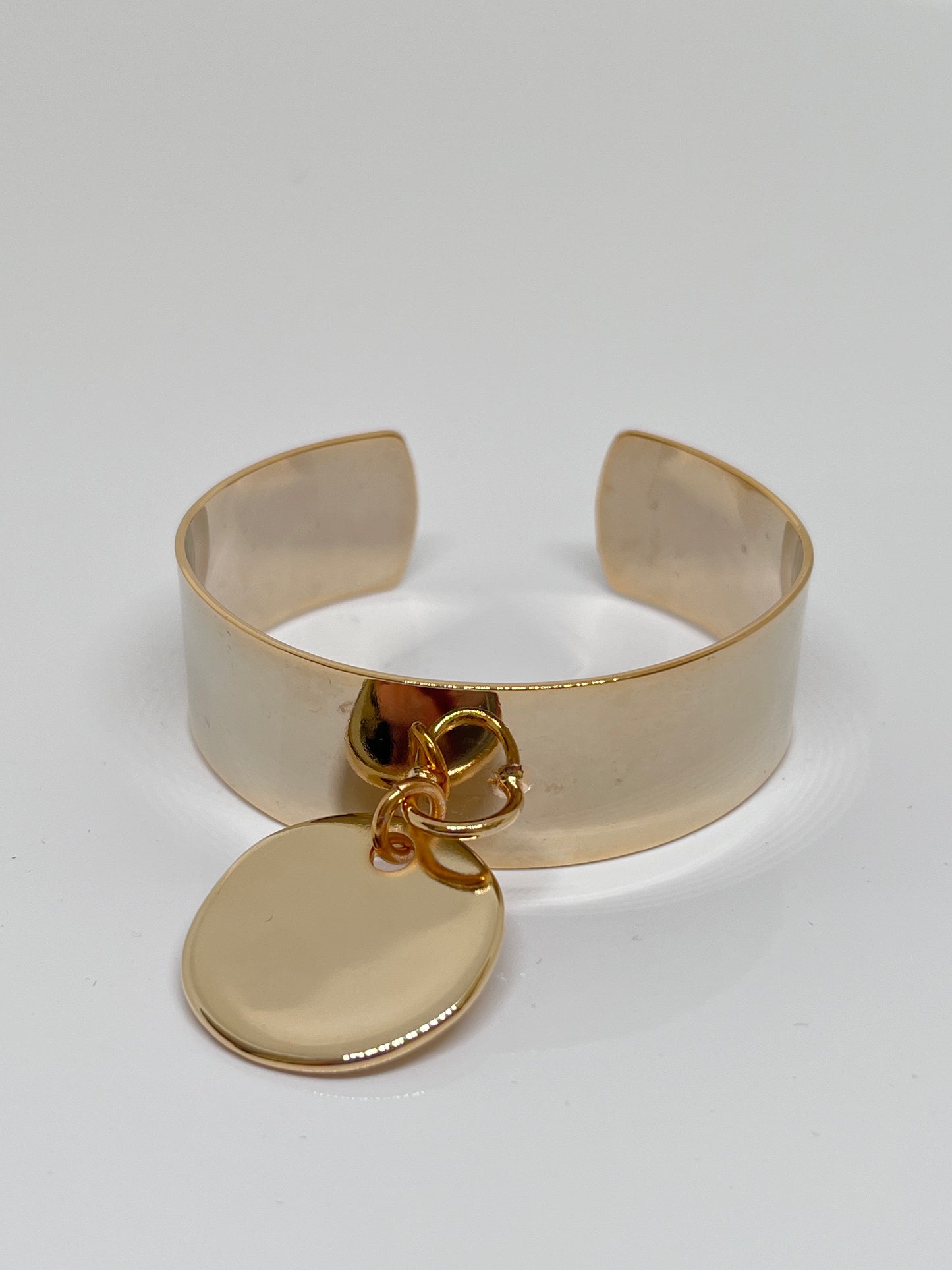 Manchette marine doré et médaille