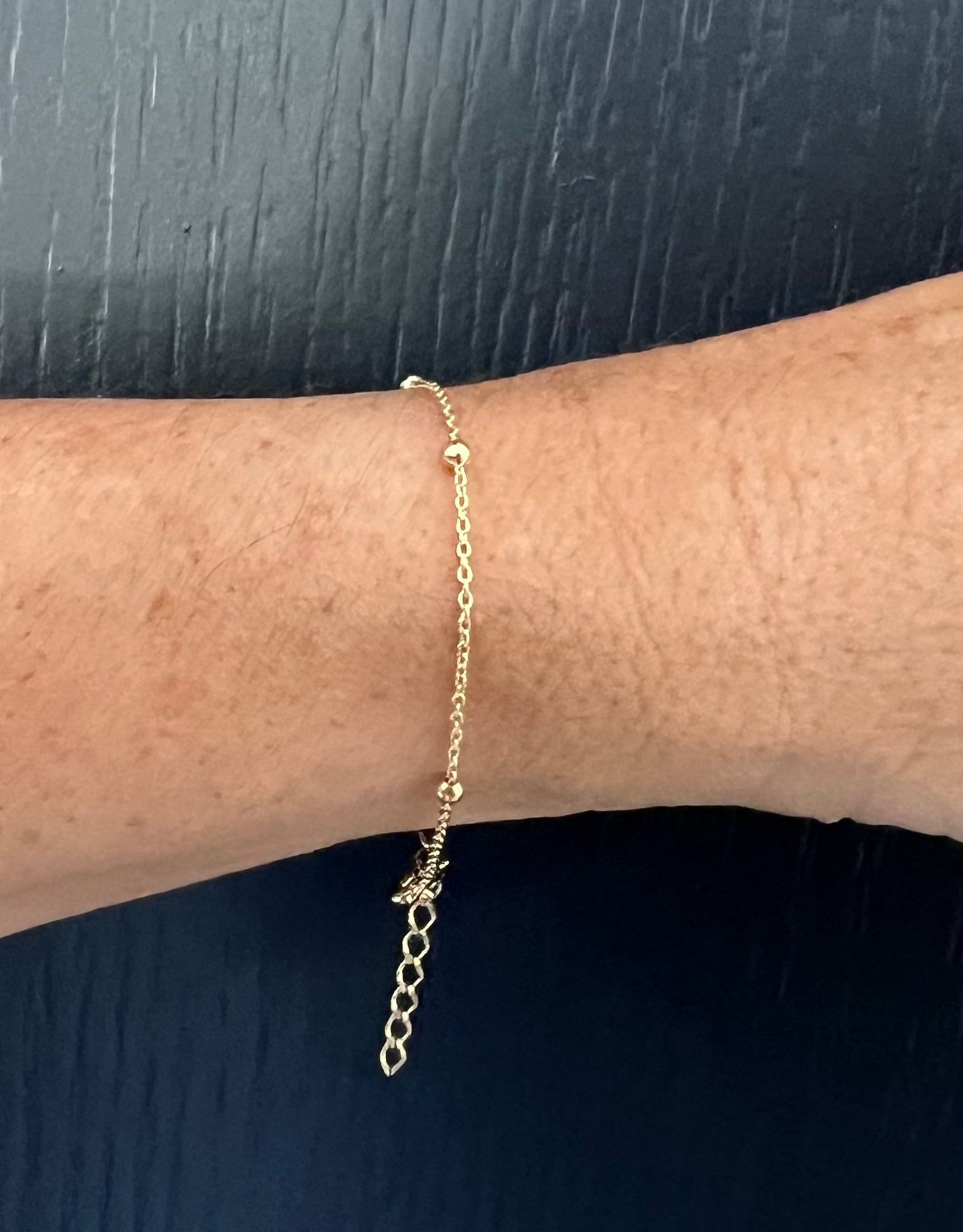 Bracelet trs fin avec boules or