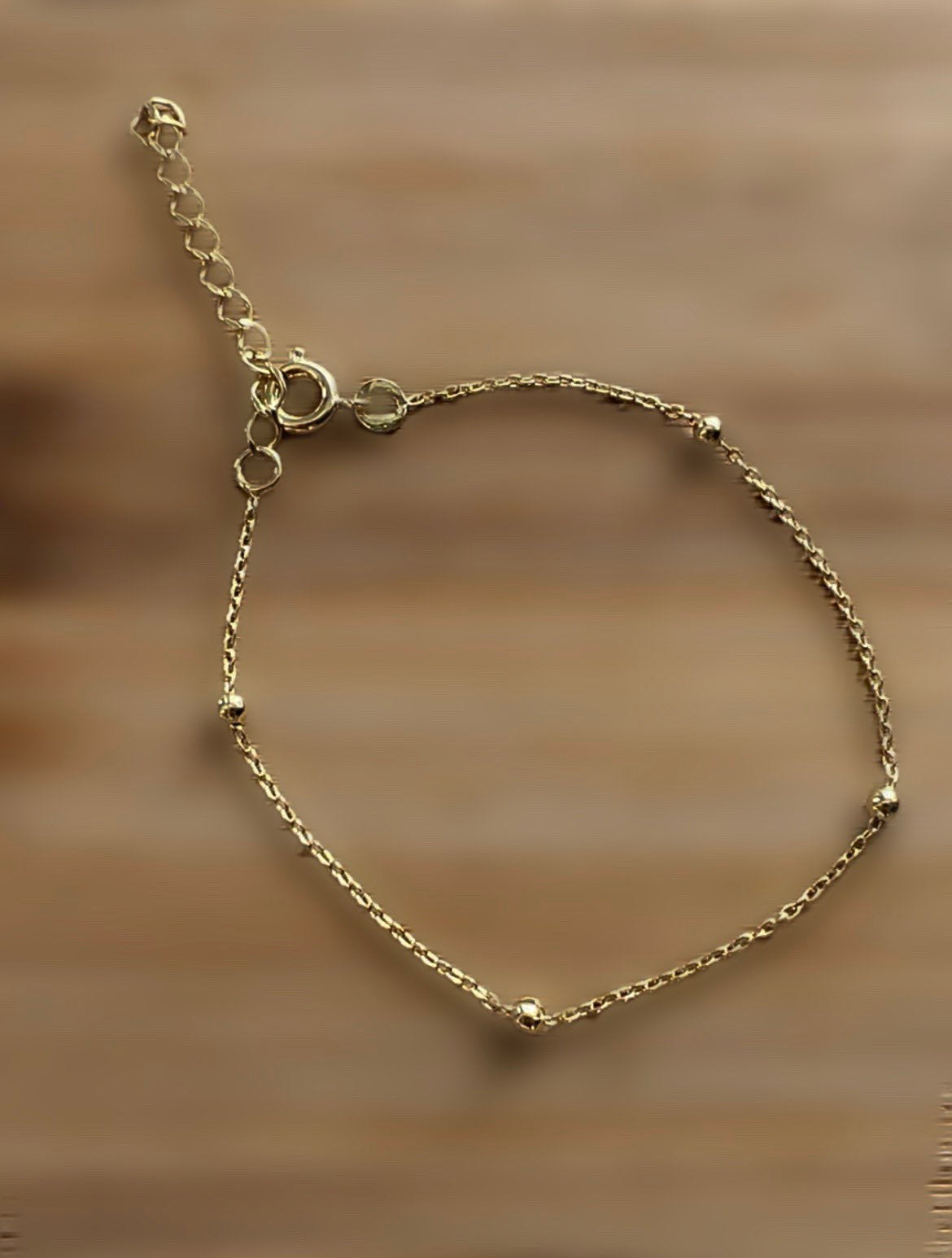 Collier trs fin avec boules or