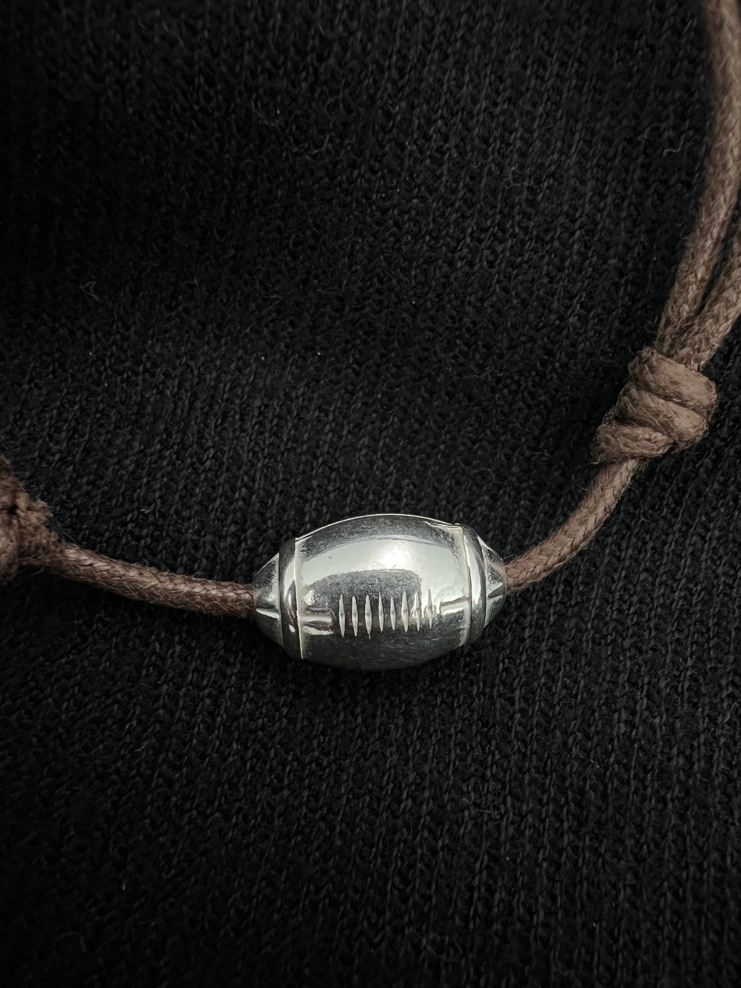 Bracelet ballon de rugby